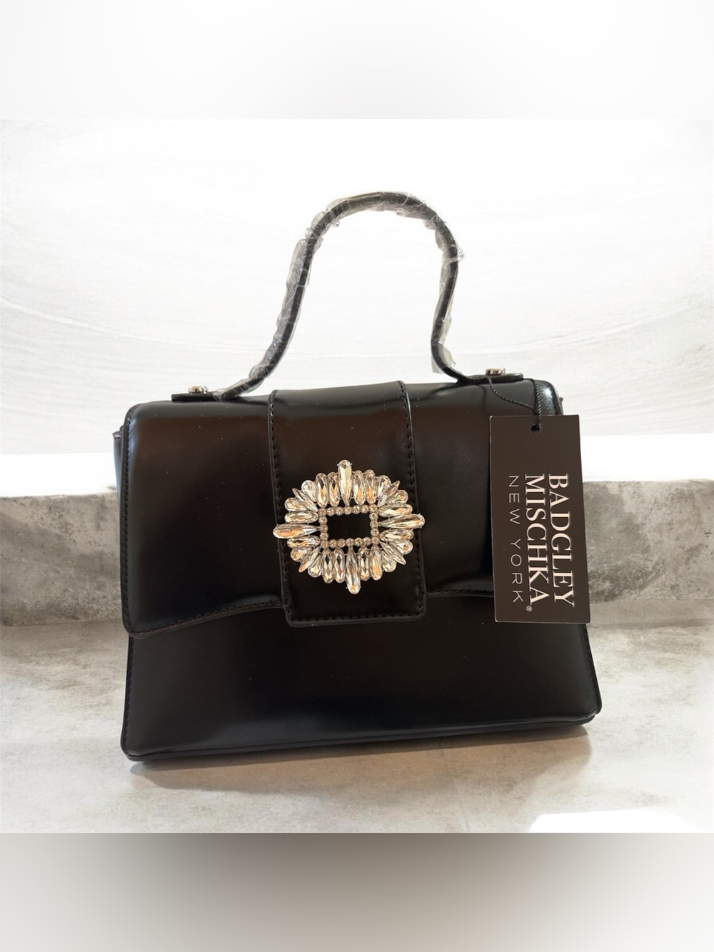 THE LORRIE SMOOTH LEATHER HANDBAG WITH RHINESTONE BROOCH